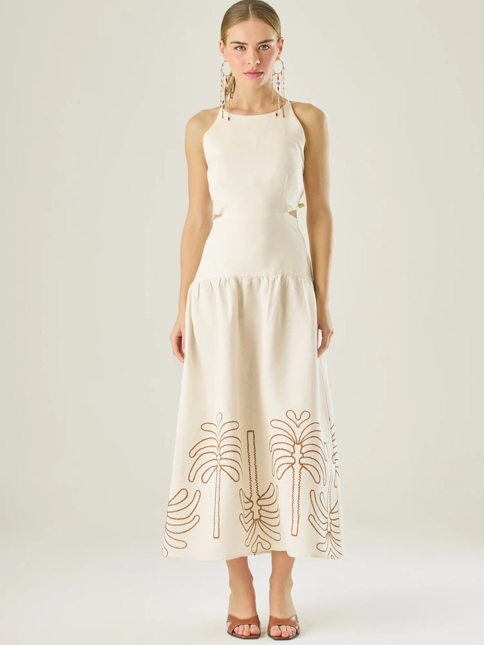 Vestido largo sin mangas con escote recto, aberturas laterales y detalle bordado en el bajo con motivos de inspiración natural. Su diseño limpio y femenino lo convierte en una opción ideal para un look sofisticado con un aire fresco y artesanal.

Detalles:

Color: Sand